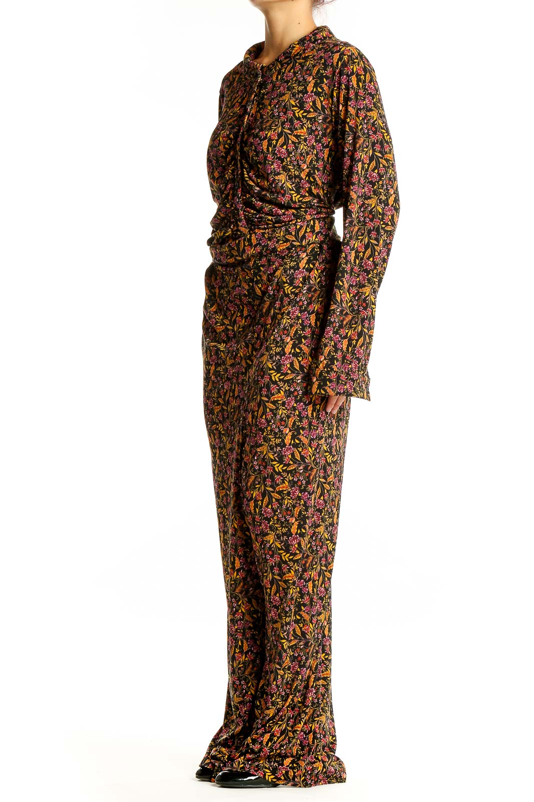 Front view of Torrid black floral print long sleeve jumpsuit