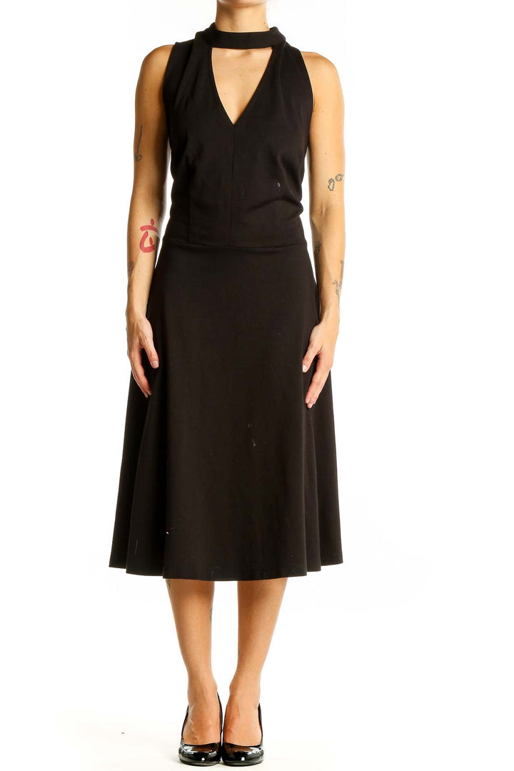 Front view of black Eloquii midi dress with choker neckline and V-cut