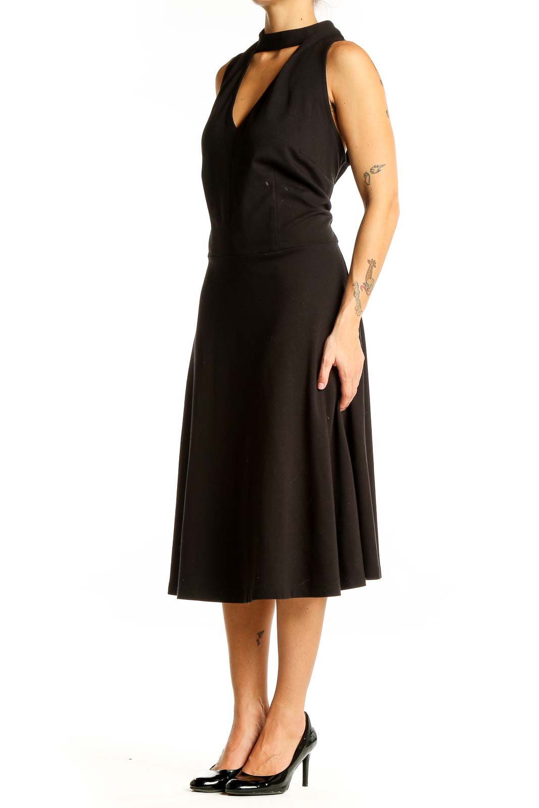 Front view of black Eloquii midi dress with choker neckline and V-cut