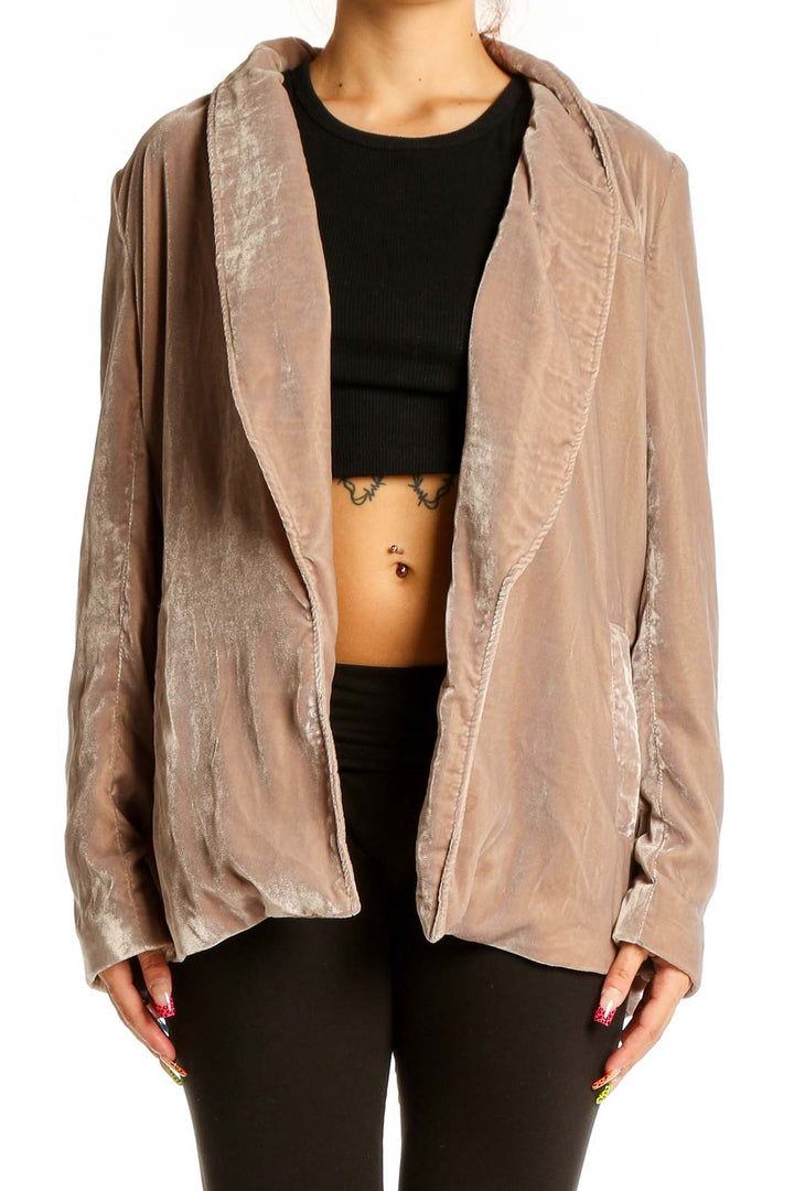 Front view of Free People beige velvet open front jacket on model