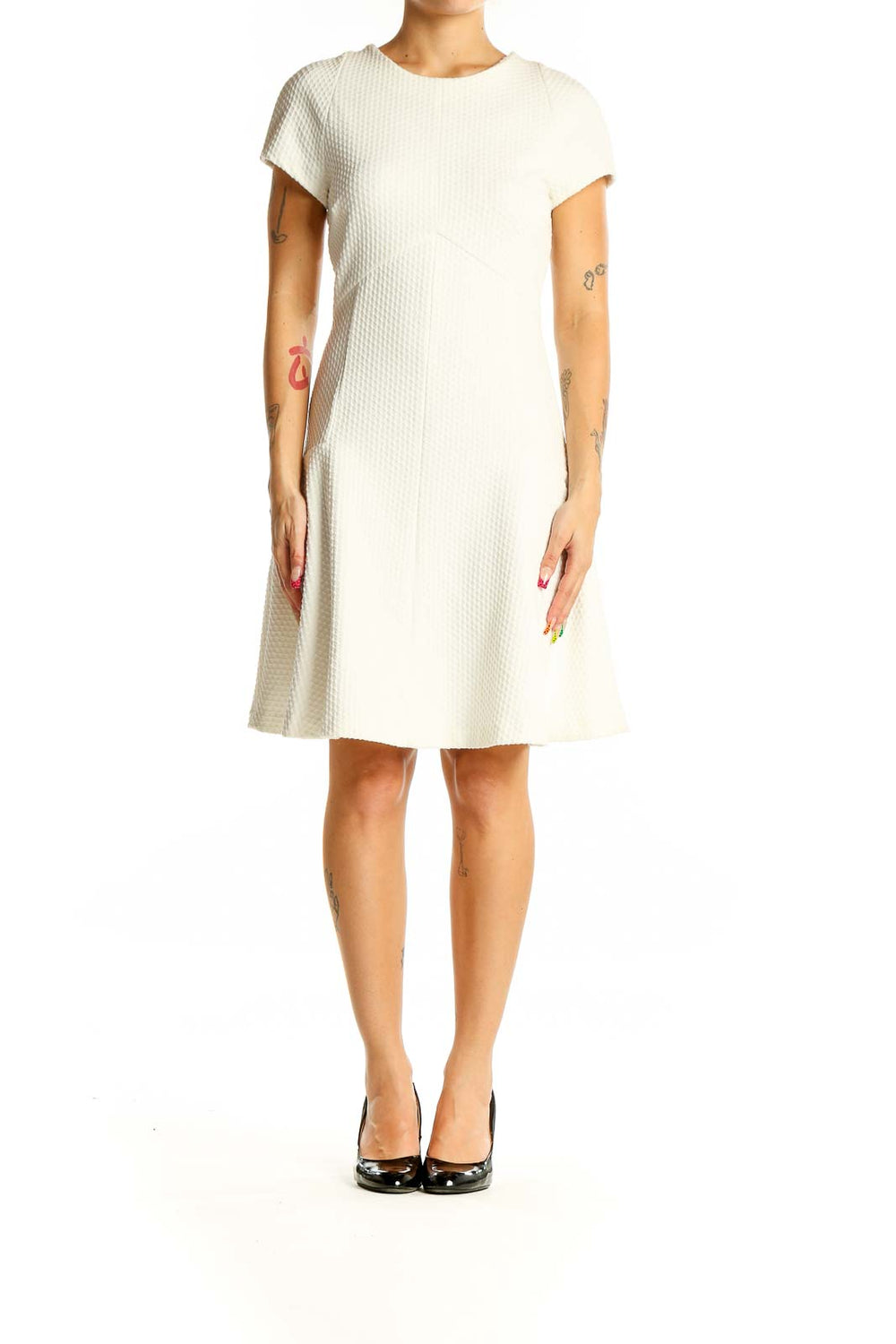 Front view of white textured fit-and-flare dress from Banana Republic