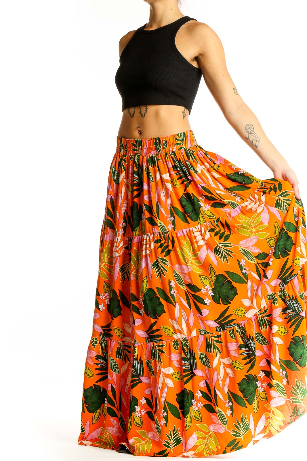 Front view of Eloquii orange tropical print maxi skirt with black crop top