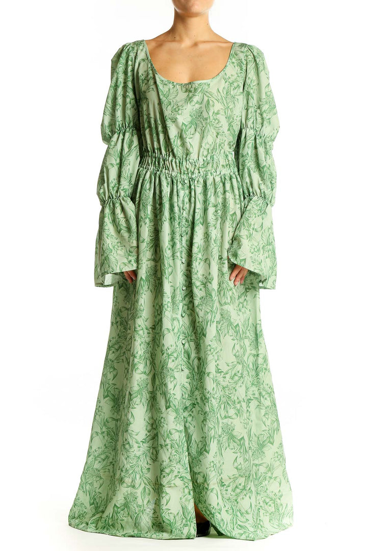 Front view of Eloquii green floral maxi dress with puff sleeves and scoop neckline