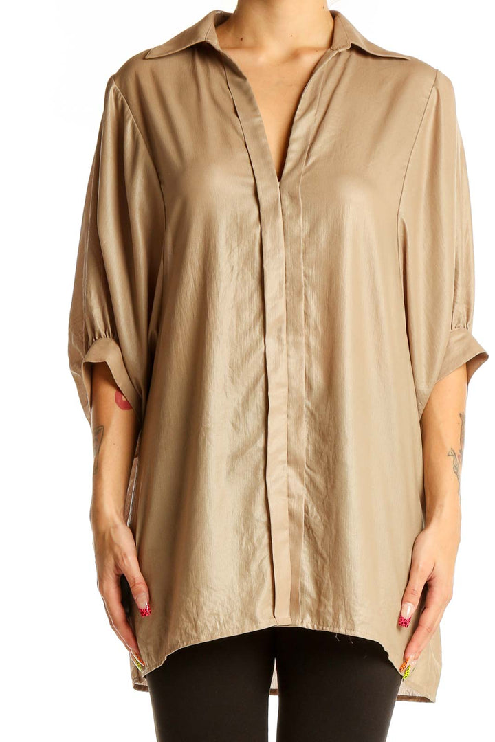 Front view of BCBG MaxAzria beige oversized button-down blouse with dolman sleeves