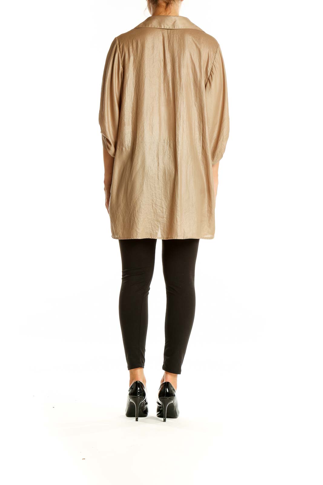 Back view of BCBG MaxAzria beige oversized button-down blouse showing high-low hemline