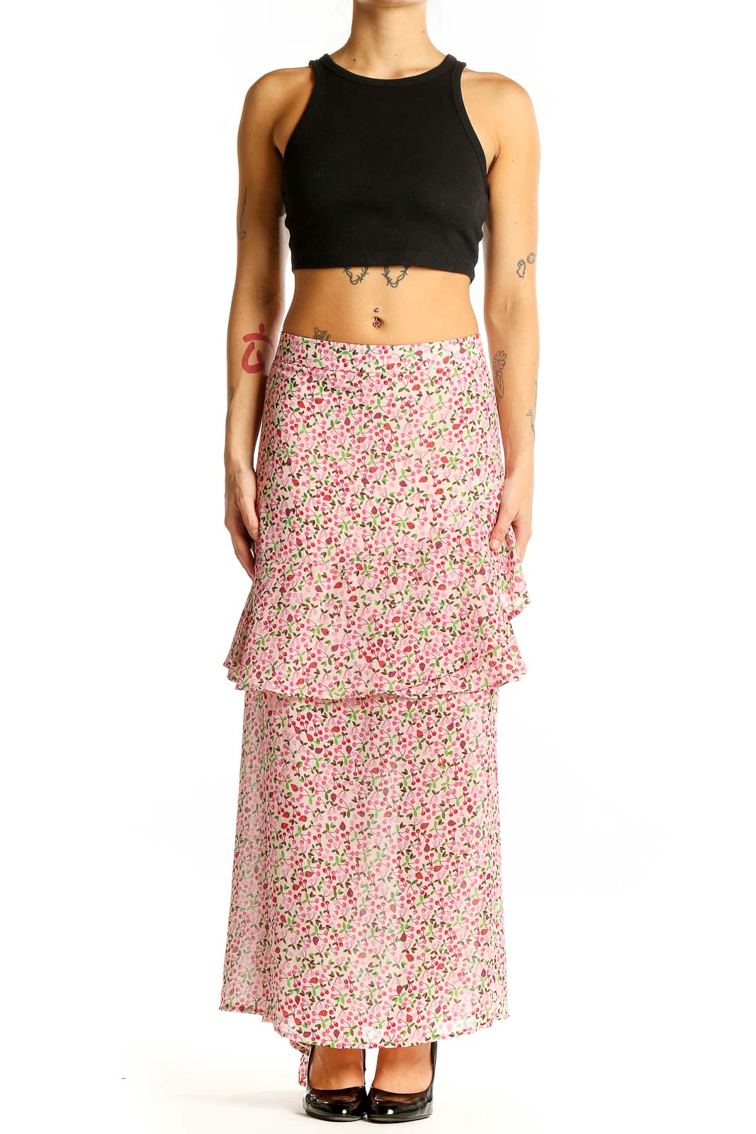 Front view of Eloquii pink floral tiered maxi skirt with black crop top