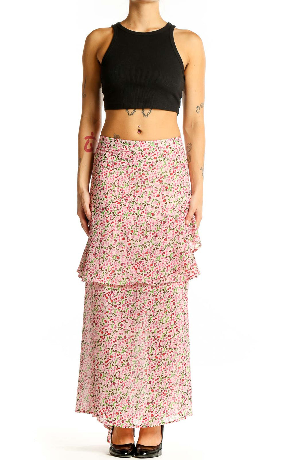 Front view of Eloquii pink floral tiered maxi skirt with black crop top