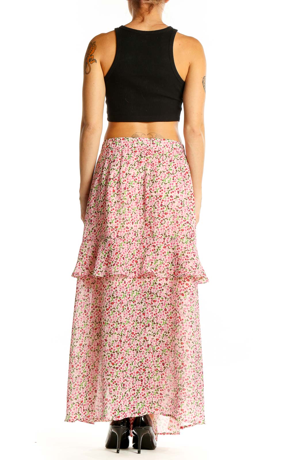 Back view of Eloquii pink floral tiered maxi skirt showing full length and tiered design