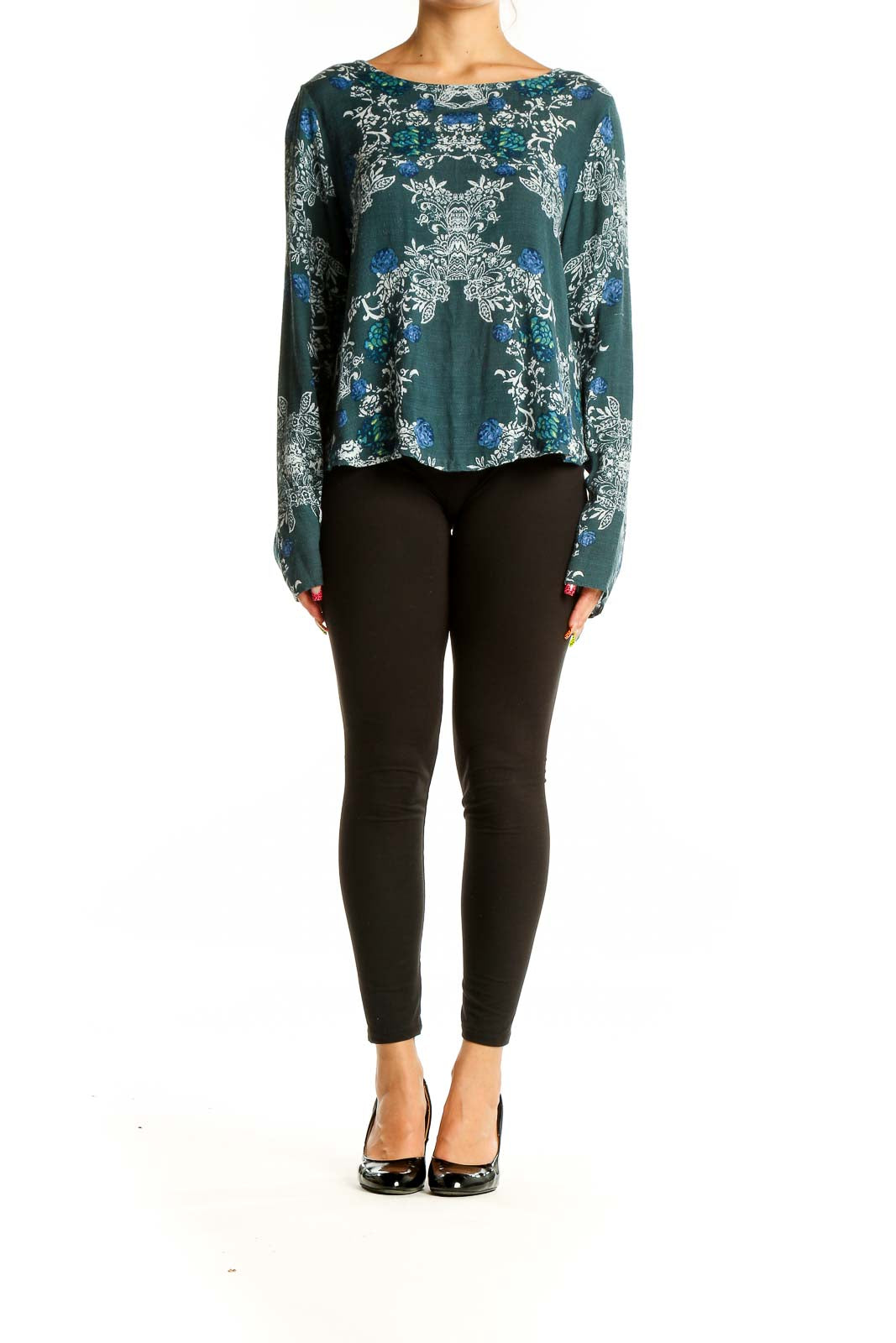 Front view of green floral long sleeve crop top by Free People