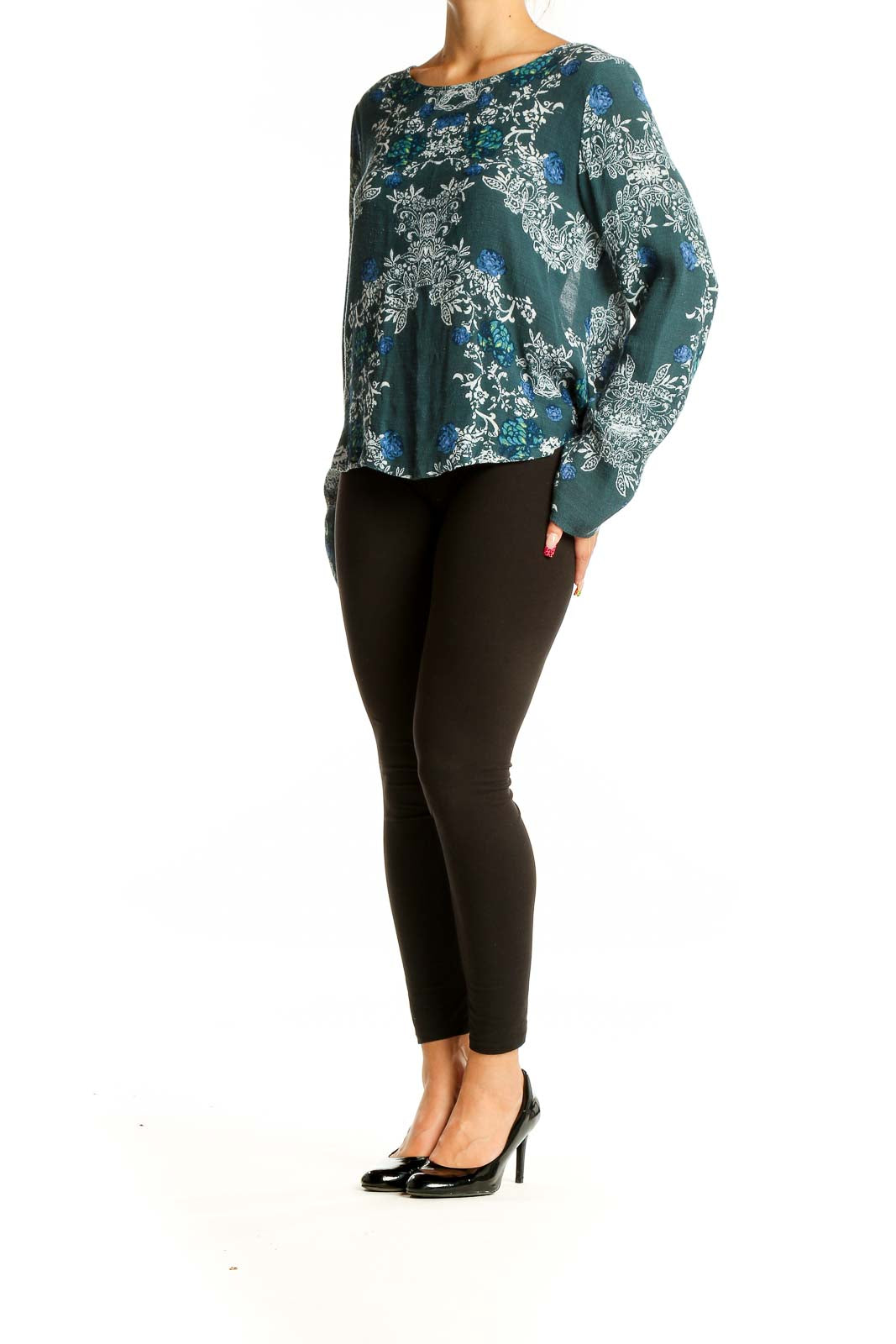 Front view of green floral long sleeve crop top by Free People