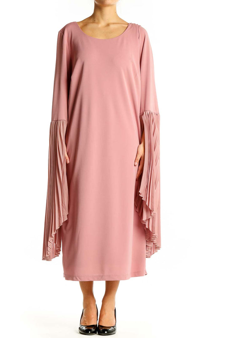 Front view of pink Eloquii midi dress with pleated bell sleeves