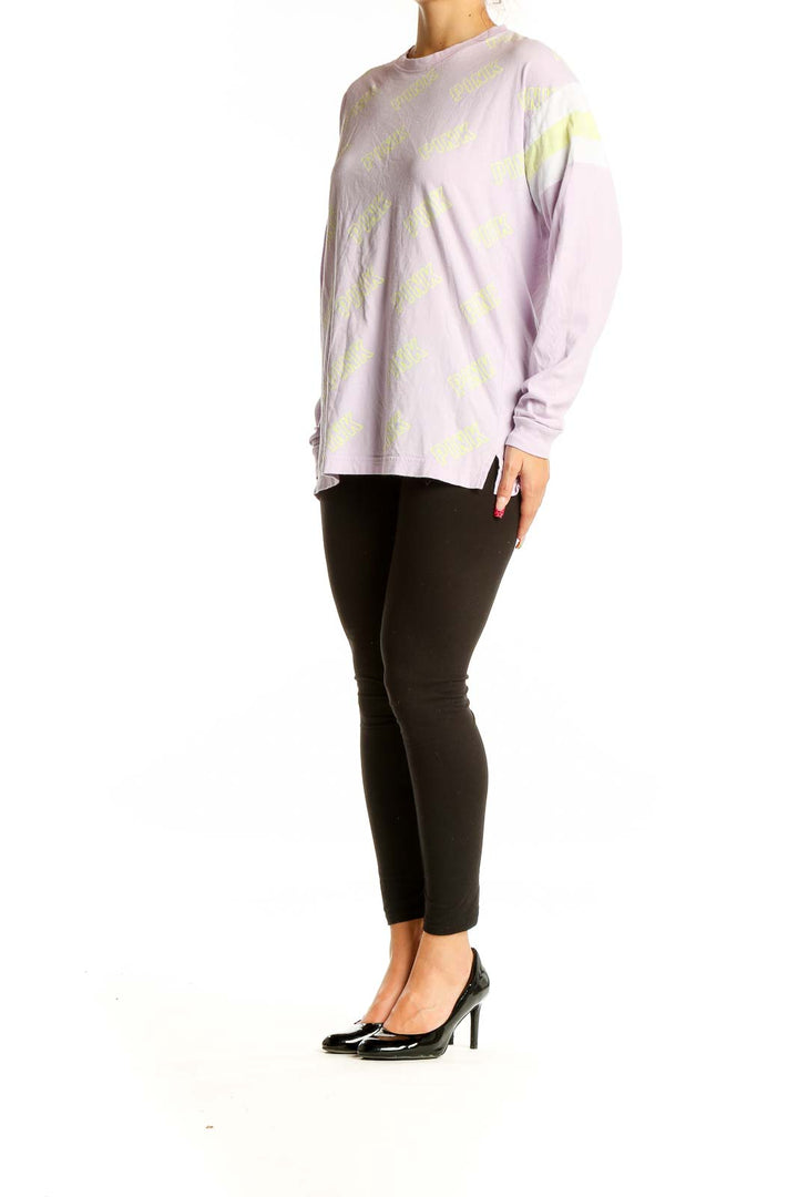 Front view of Pink Victoria's Secret lavender long sleeve tee with yellow logo print