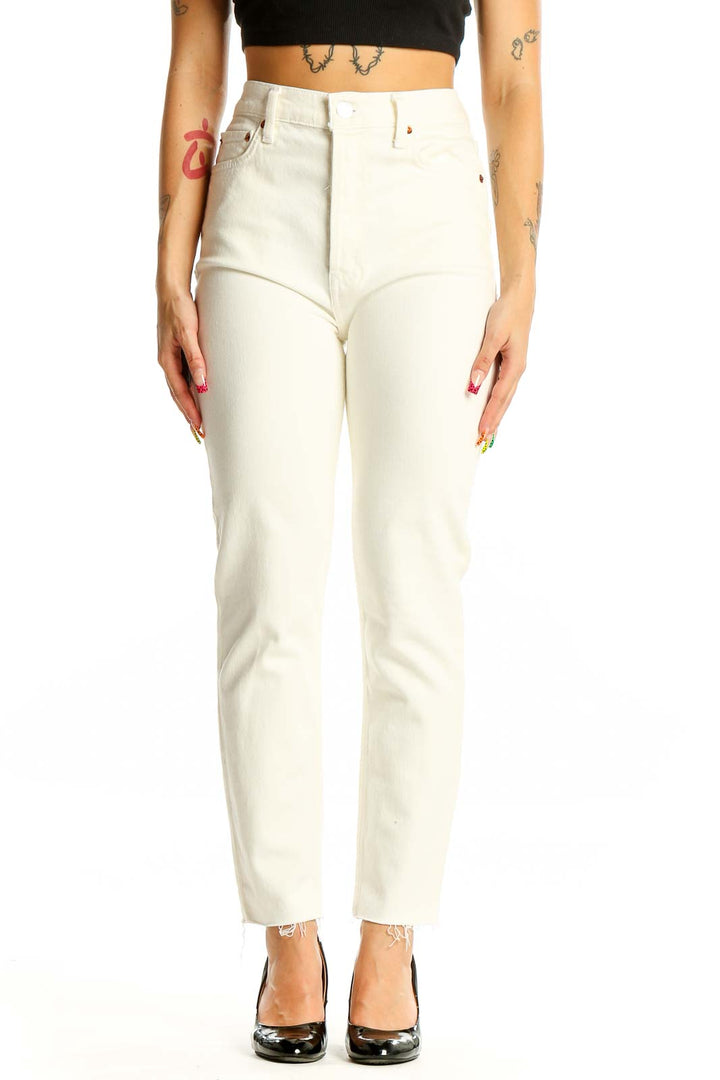 Front view of RE/DONE cream high-waisted straight leg jeans