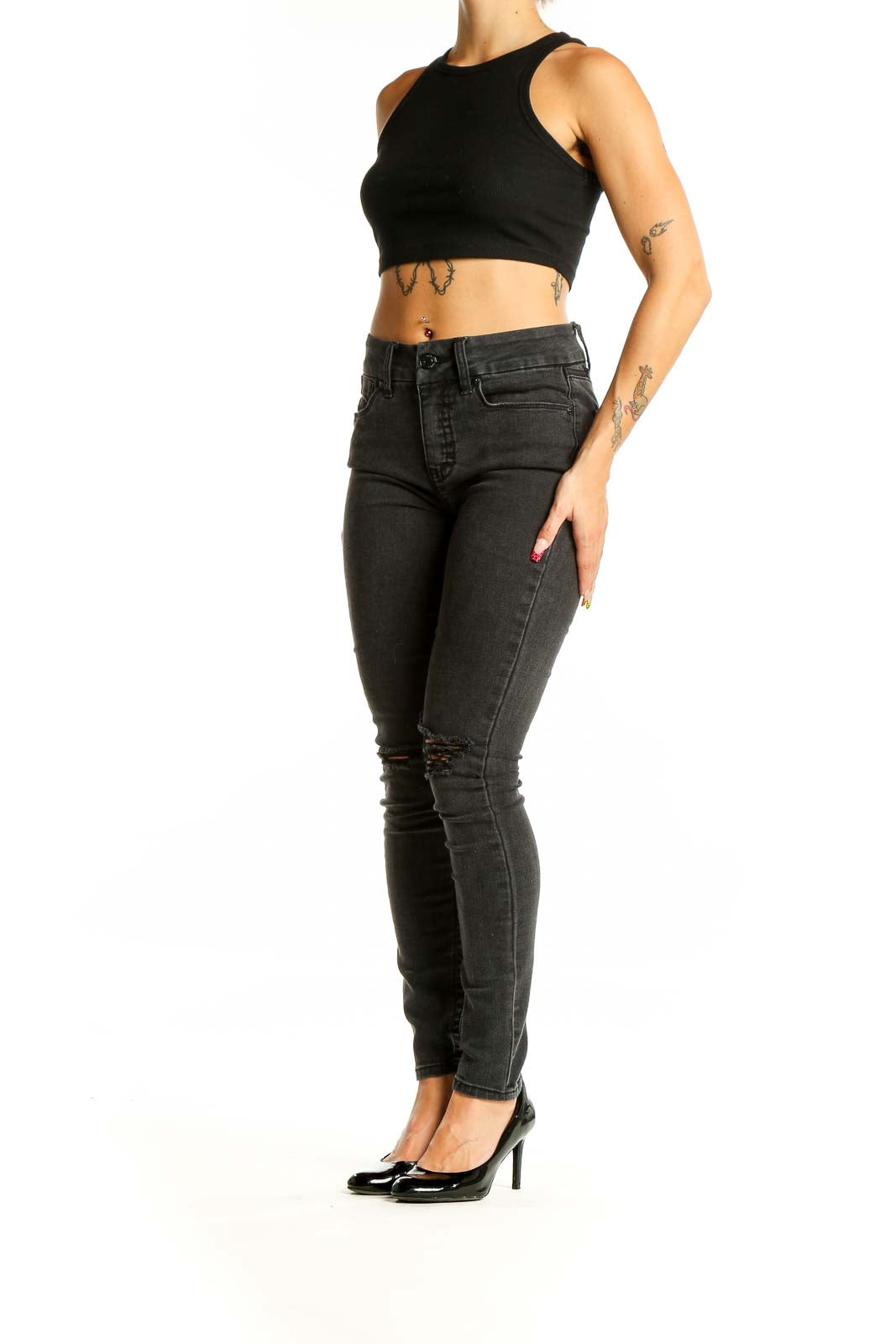 Front view of Seven7 black distressed skinny jeans on model