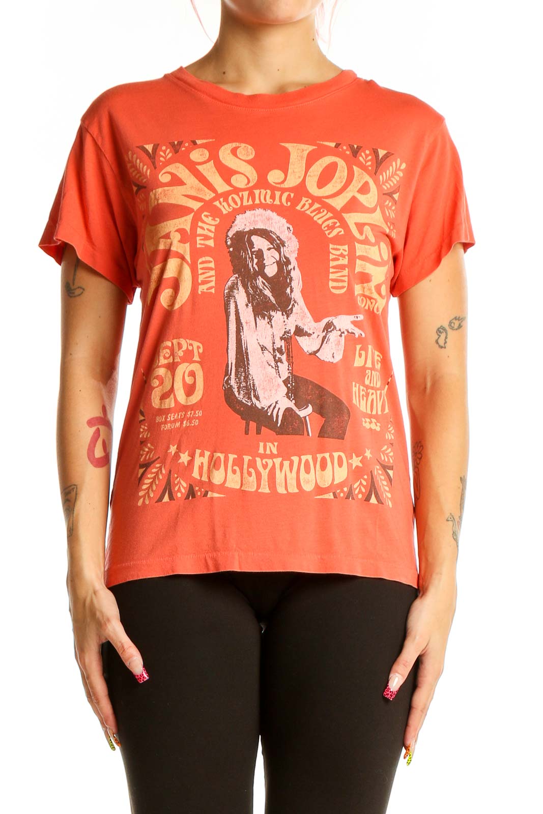 Orange Anthropologie t-shirt with retro Janis Joplin graphic print