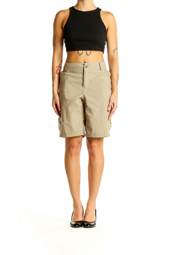 Front view of khaki cargo Bermuda shorts from Duluth Trading Co