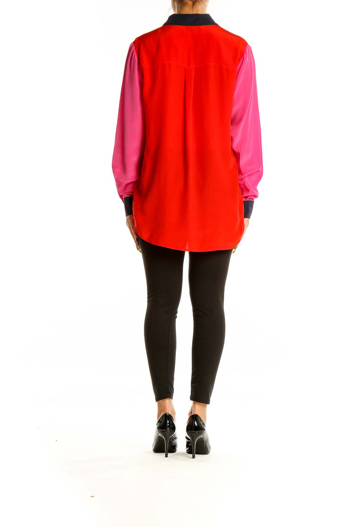 Back view of Boden red and pink color-block silk blouse showing relaxed fit