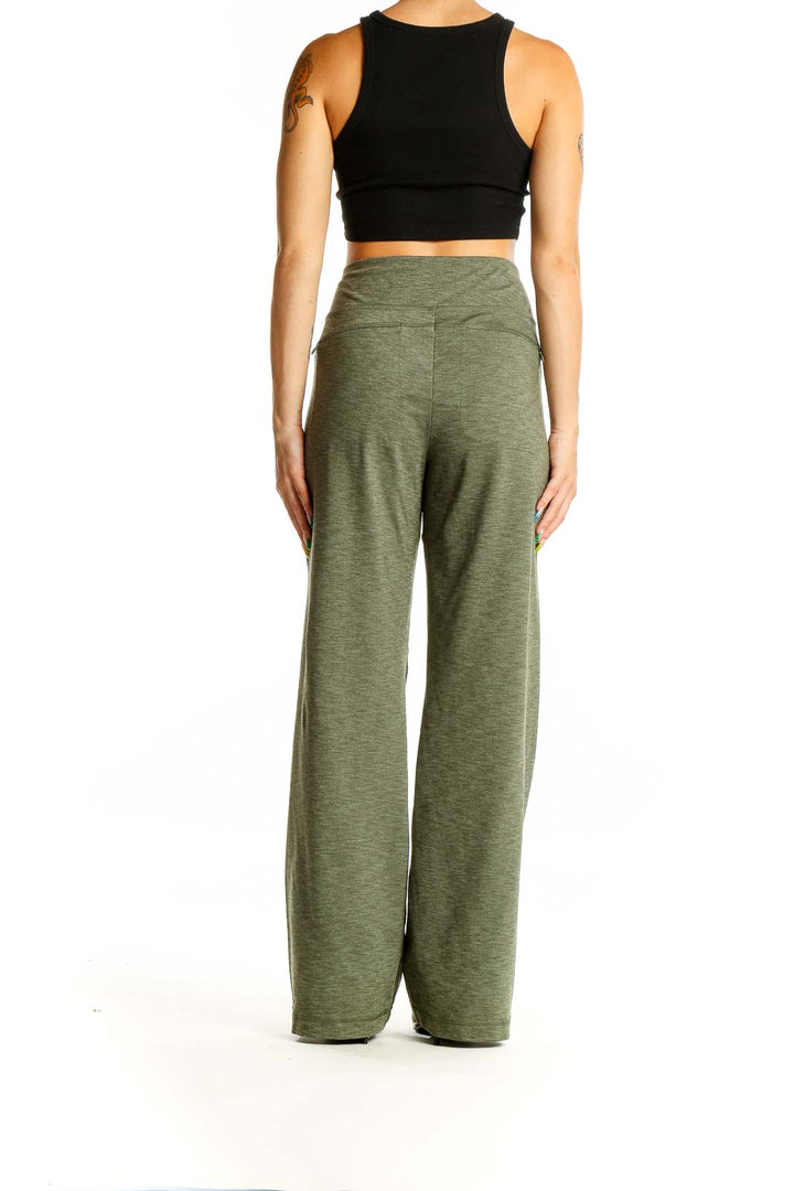 Back view of olive wide-leg activewear pants from Duluth Trading Co