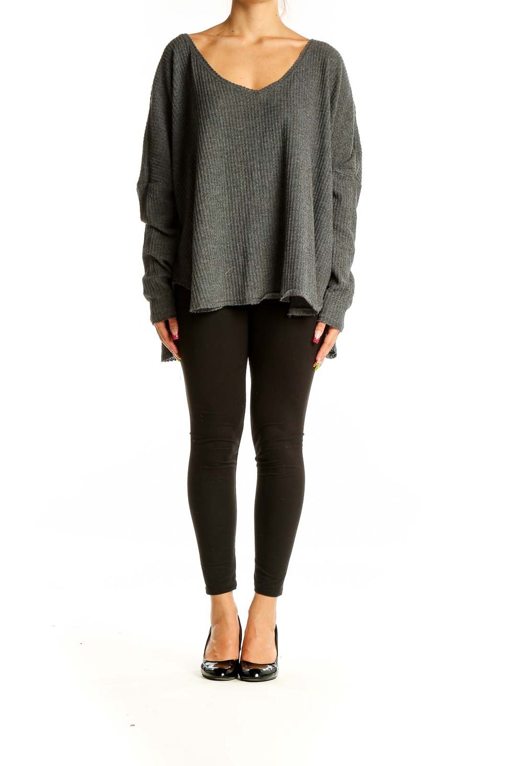 Front view of gray oversized ribbed knit sweater with deep V-neckline