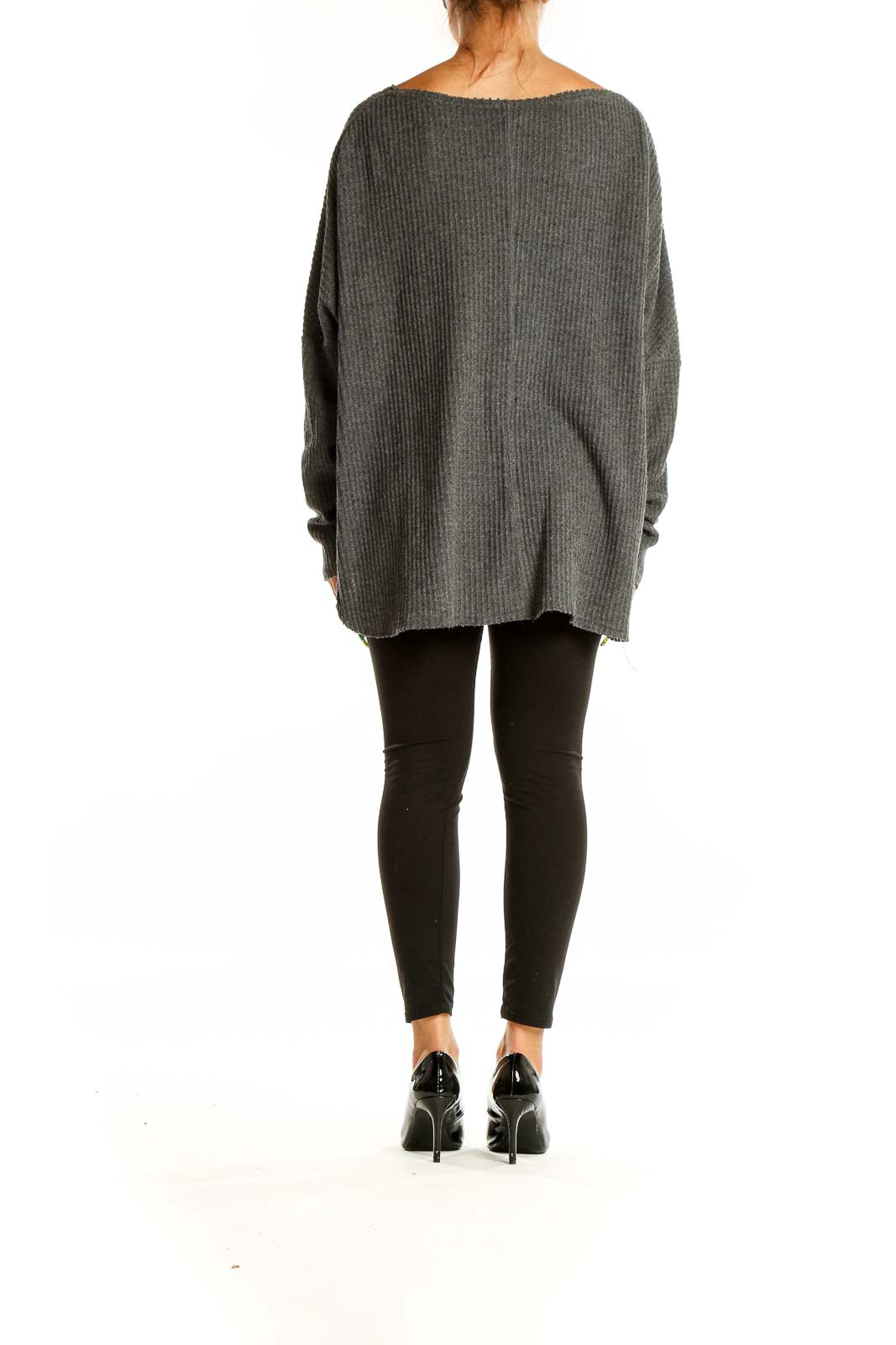 Back view of gray oversized ribbed knit sweater showing relaxed fit