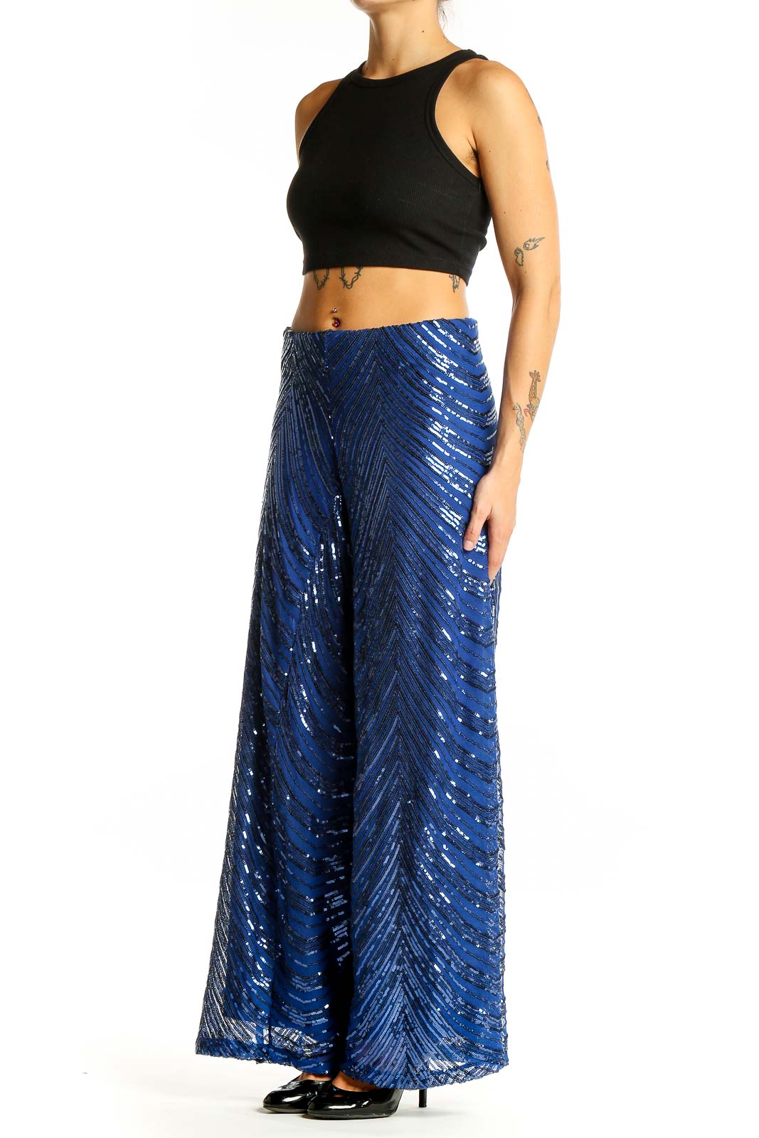 Front view of Eloquii blue sequin wide-leg palazzo pants with chevron pattern