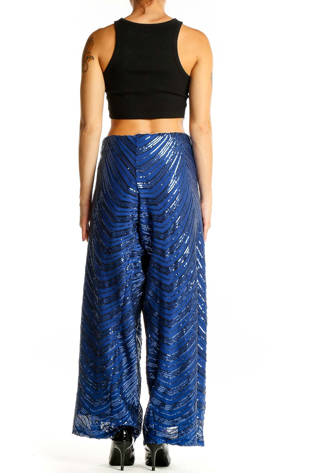 Back view of Eloquii blue sequin wide-leg palazzo pants showing full length and fit