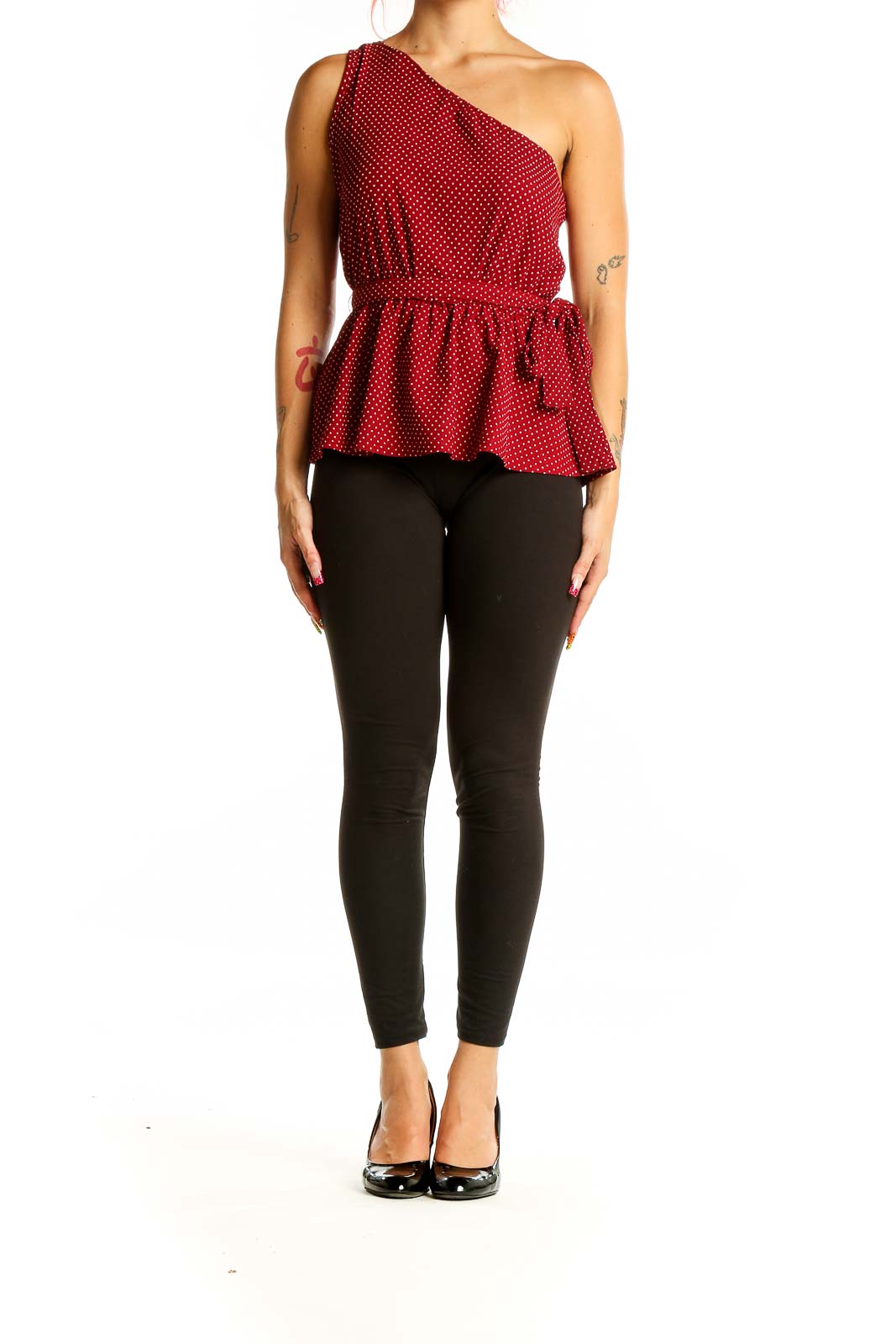 Front view of SilkRoll red polka dot one-shoulder peplum top