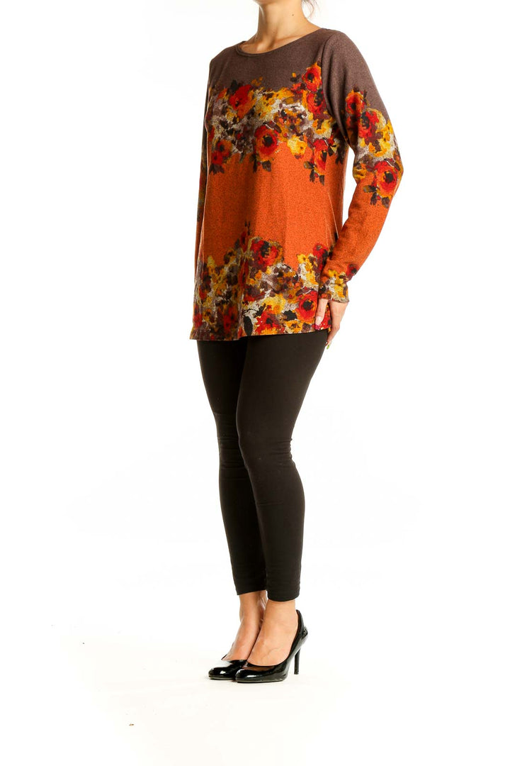 Front view of SimontonSays orange floral print long sleeve knit top