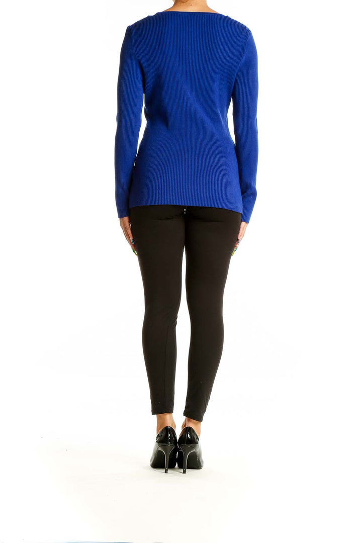 Back view of INC Royal Blue Ribbed Cutout Sweater on model