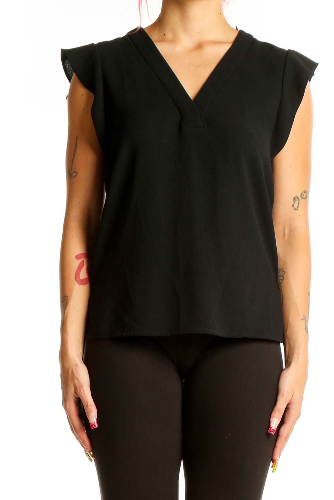 Front view of Zara black V-neck blouse with cap sleeves