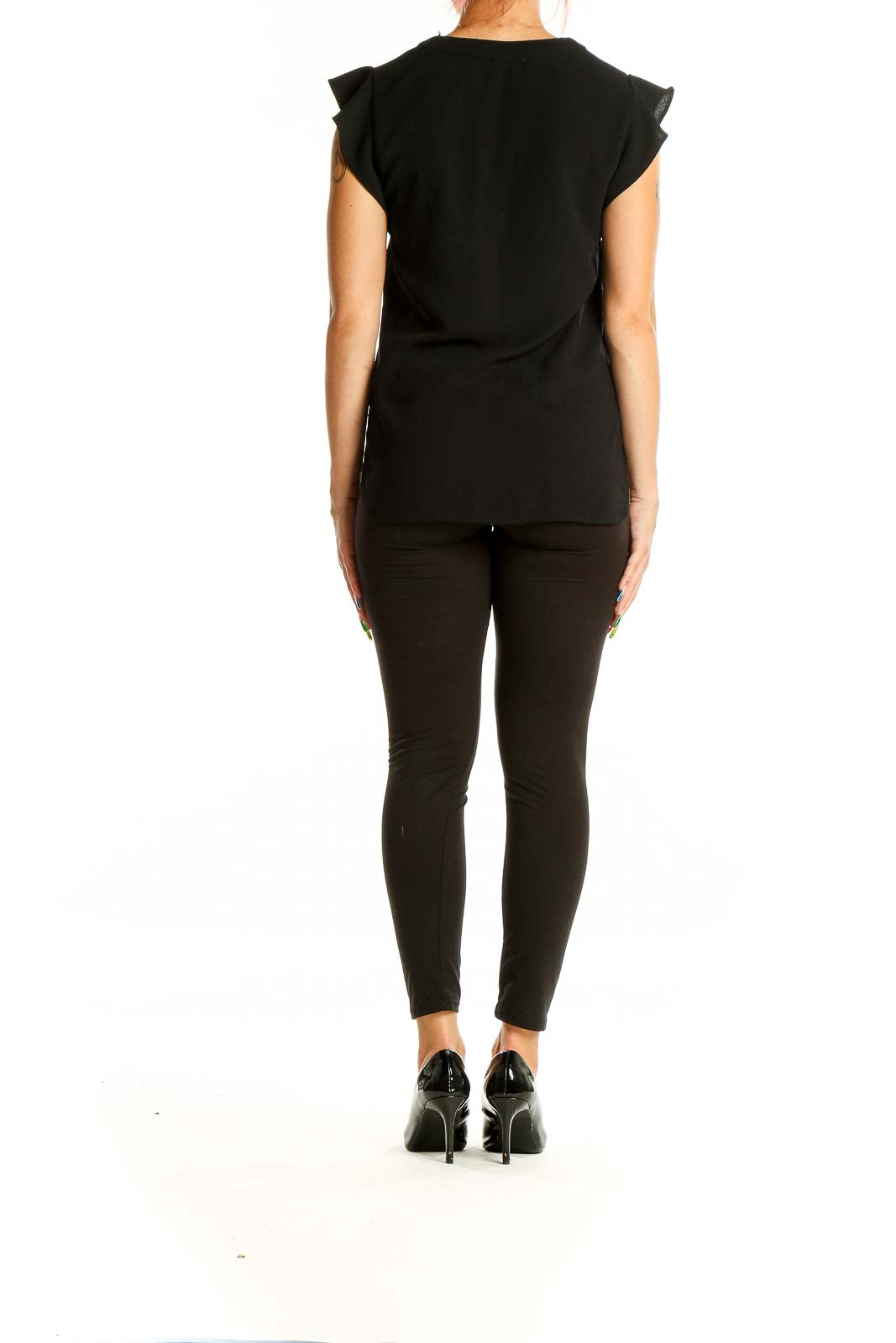 Back view of Zara black V-neck blouse showing sleek design