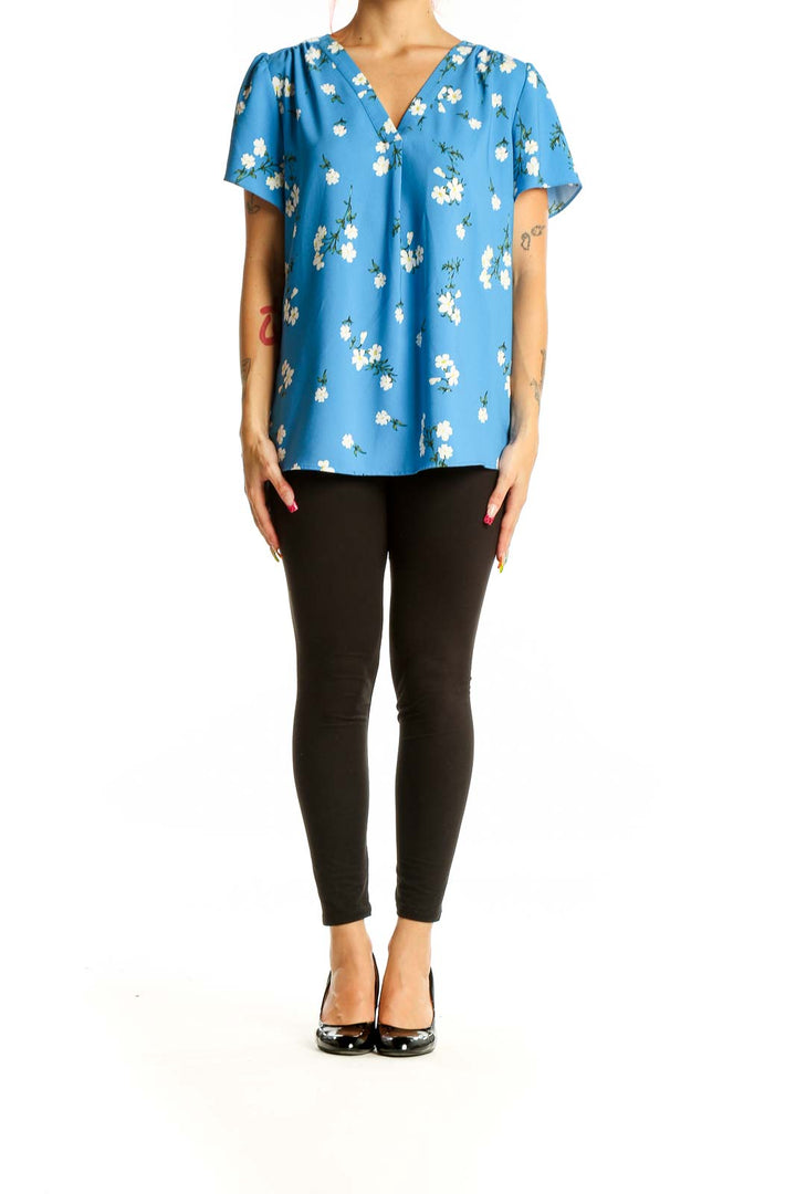 Front view of Hilary Radley blue floral V-neck blouse with short sleeves