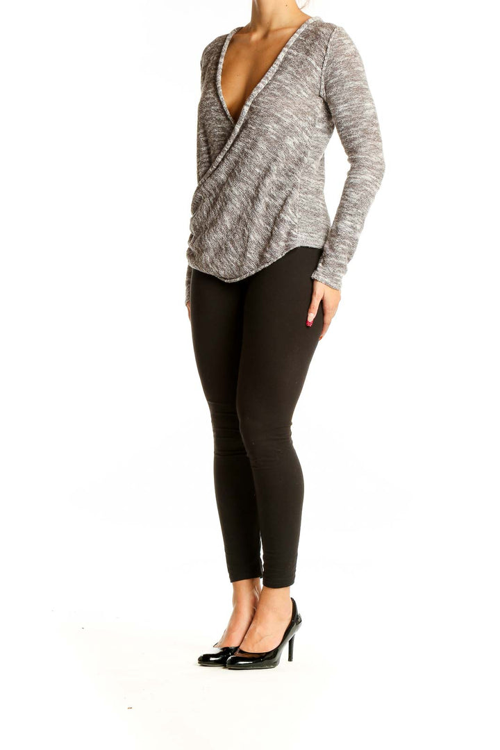 Front view of gray wrap-style knit sweater from Free People