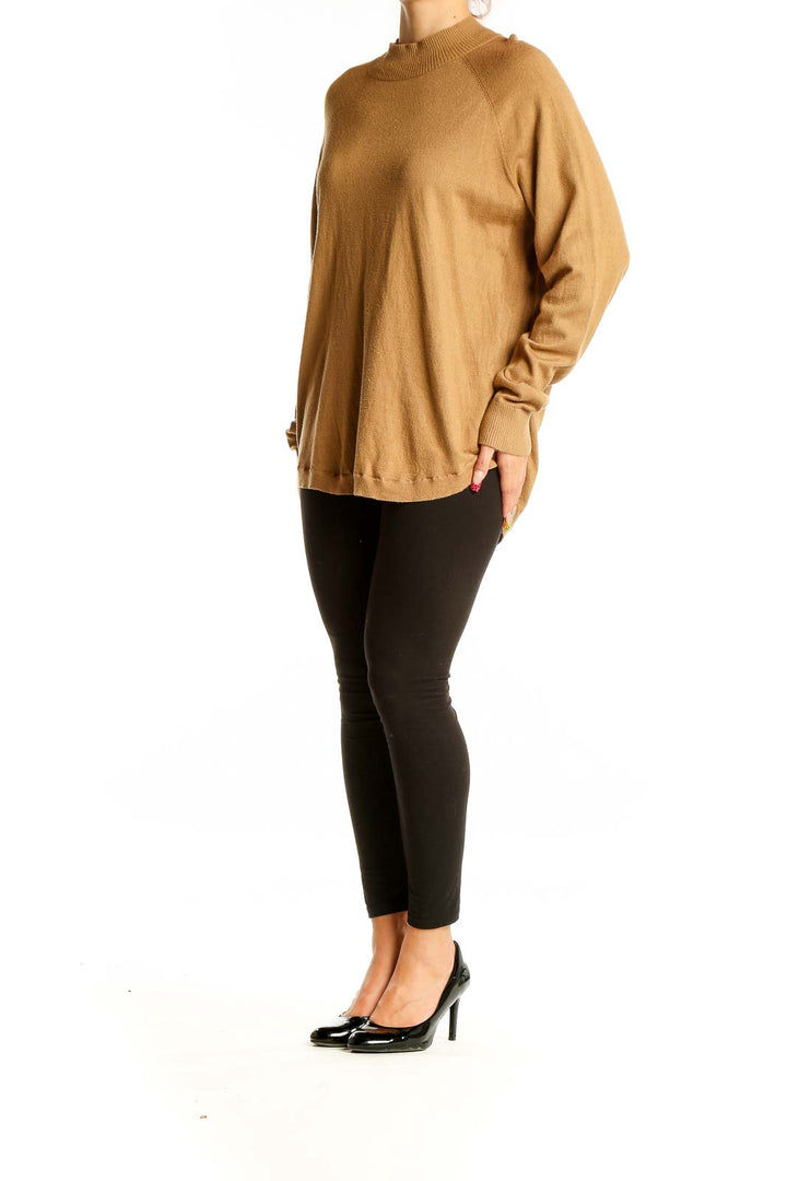 Front view of camel Michael Kors mock neck sweater with raglan sleeves