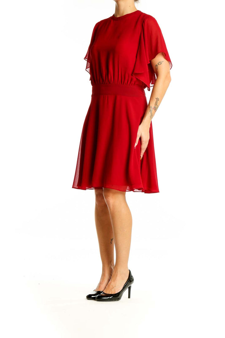 Front view of Rebecca Minkoff red chiffon cocktail dress with flutter sleeves