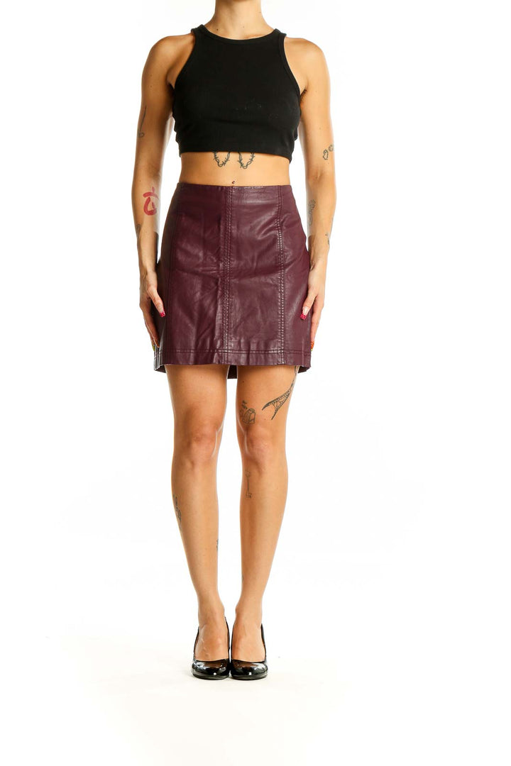 Front view of burgundy leather mini skirt from Free People