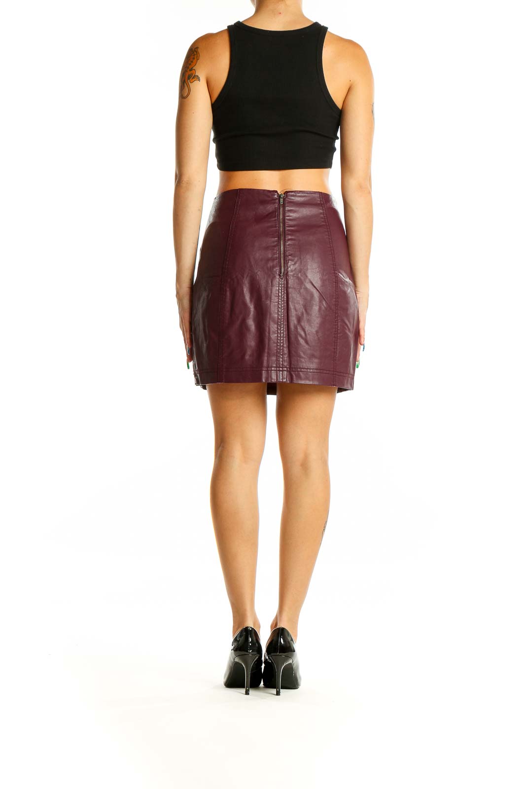 Back view of burgundy leather mini skirt from Free People