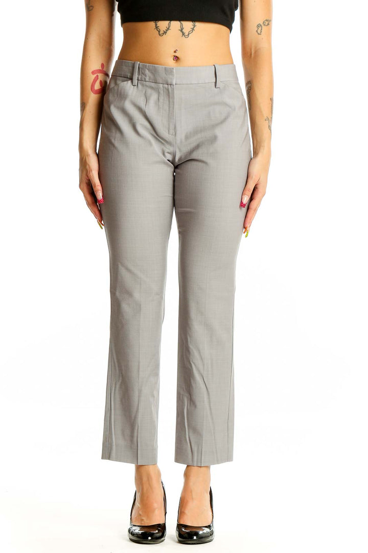 Front view of gray Theory tailored trousers on model