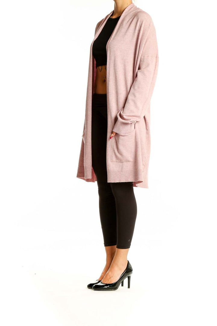 Front view of pink Cyrus long open front cardigan