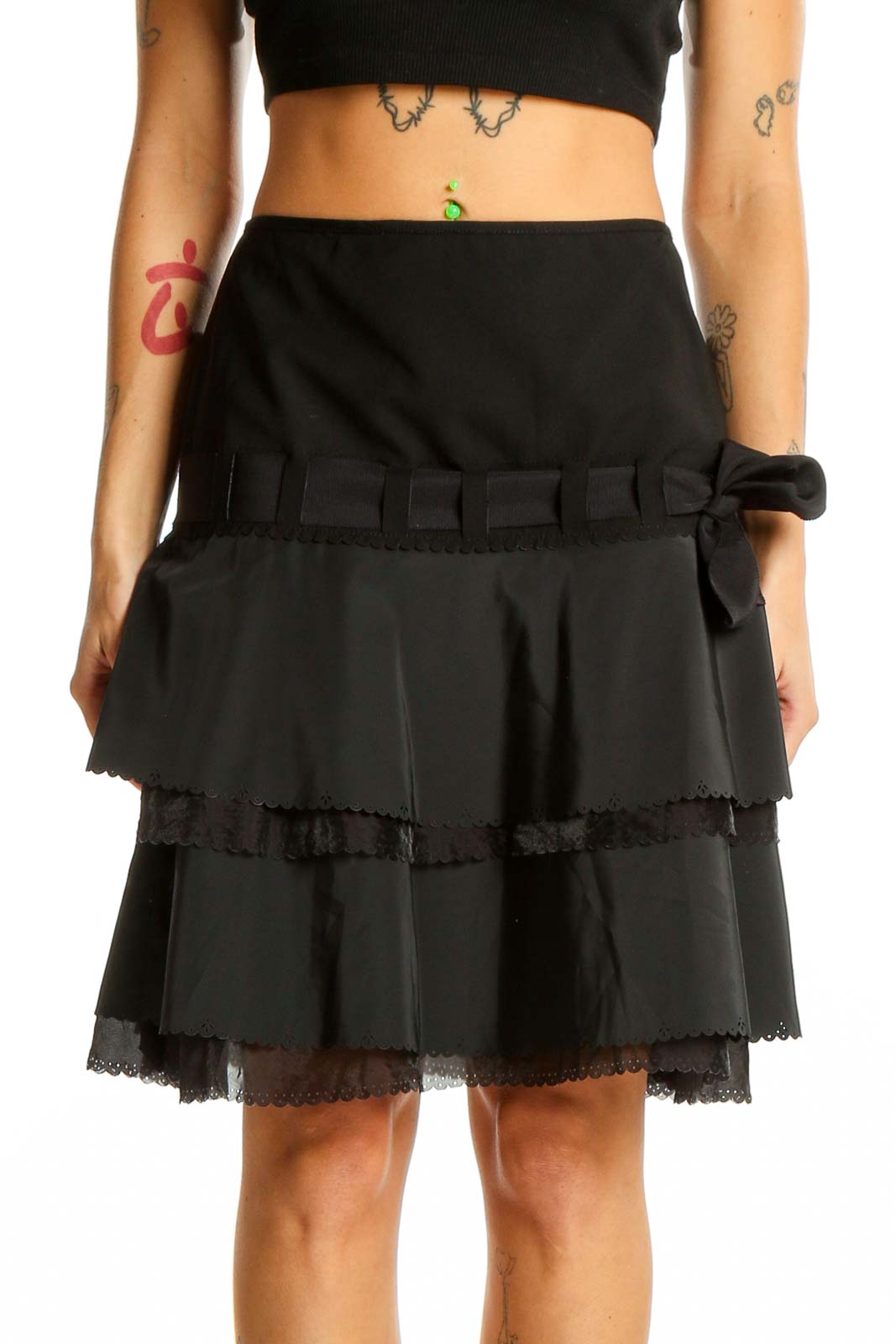 Front view of Elie Tahari black tiered ruffle skirt with bow-detailed waistband