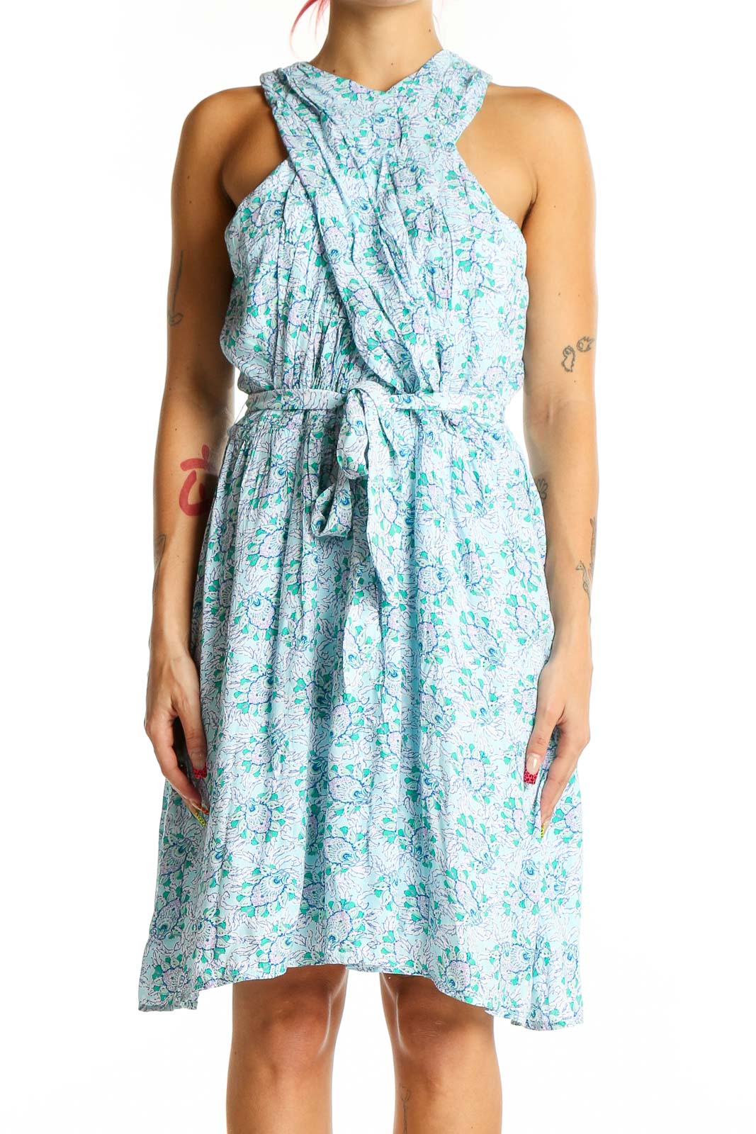 Front view of LOFT blue floral halter dress with gathered waist