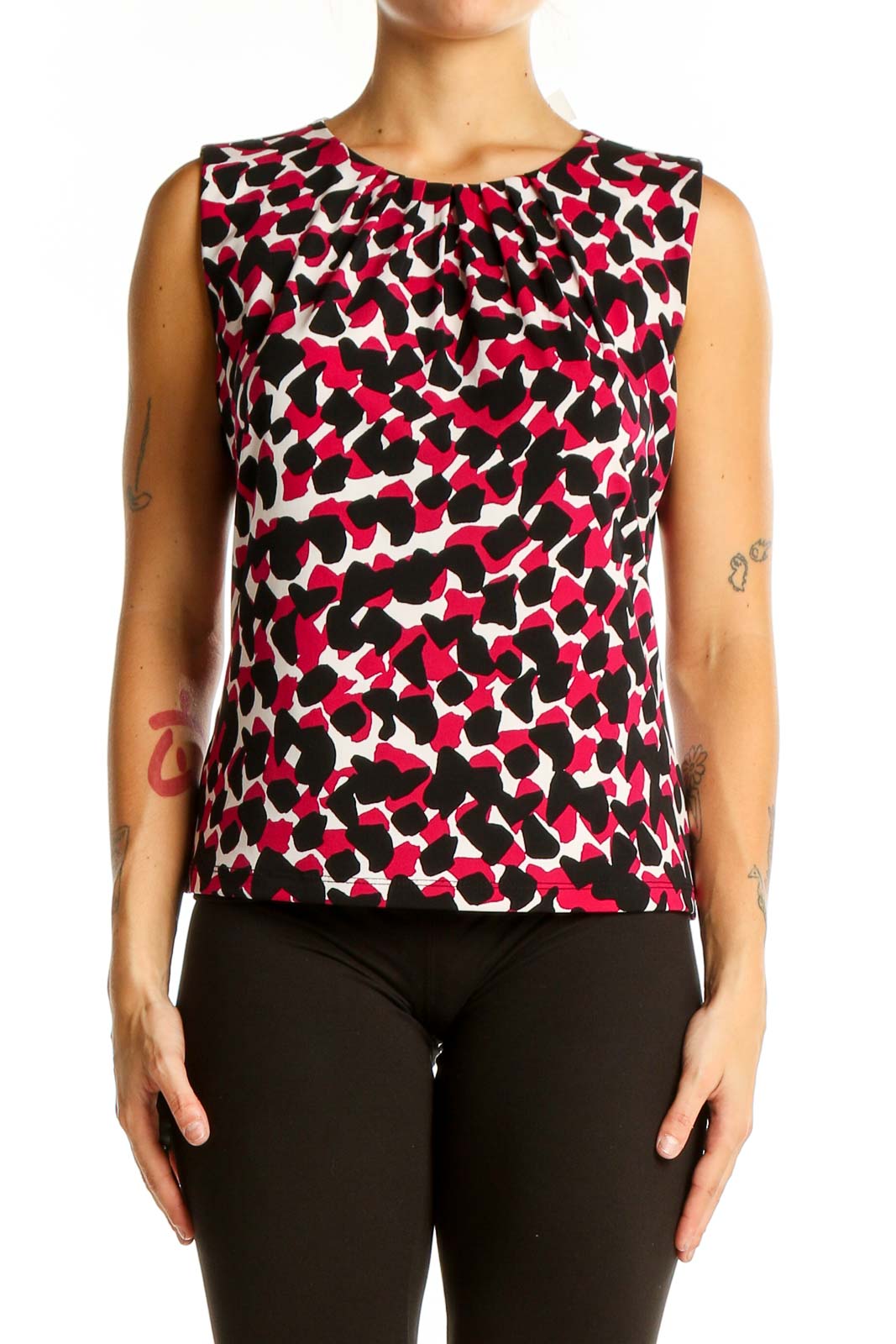 Front view of Calvin Klein sleeveless top with red and black abstract print