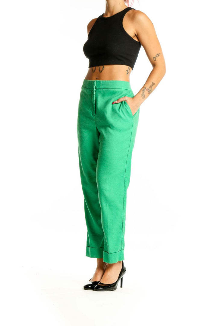 Front view of Ann Taylor green linen blend cropped trousers