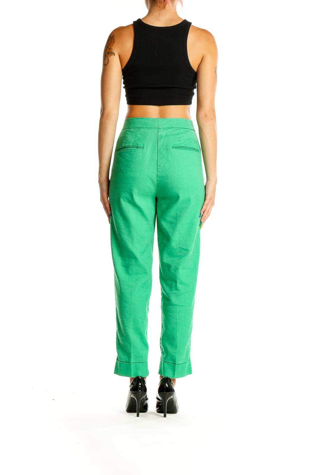 Back view of Ann Taylor green linen blend cropped trousers on model