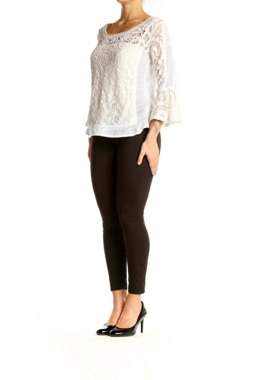 Front view of Nanette Lepore white lace blouse with bell sleeves