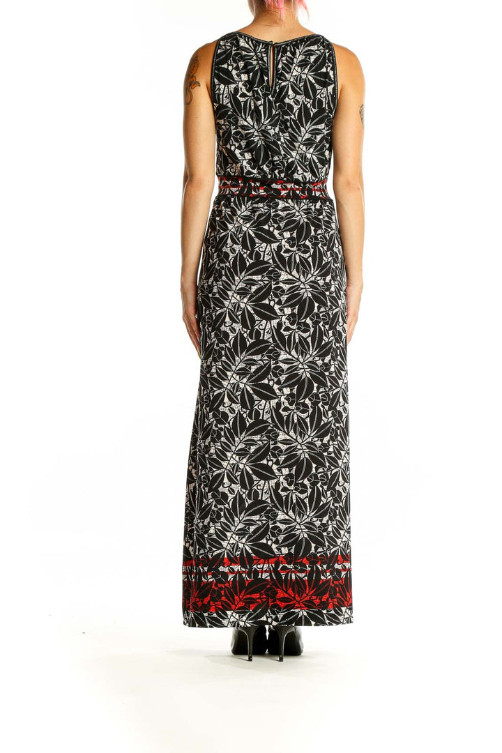 Back view of Max Studio Black Floral Print Maxi Dress showing sleeveless design and floral pattern