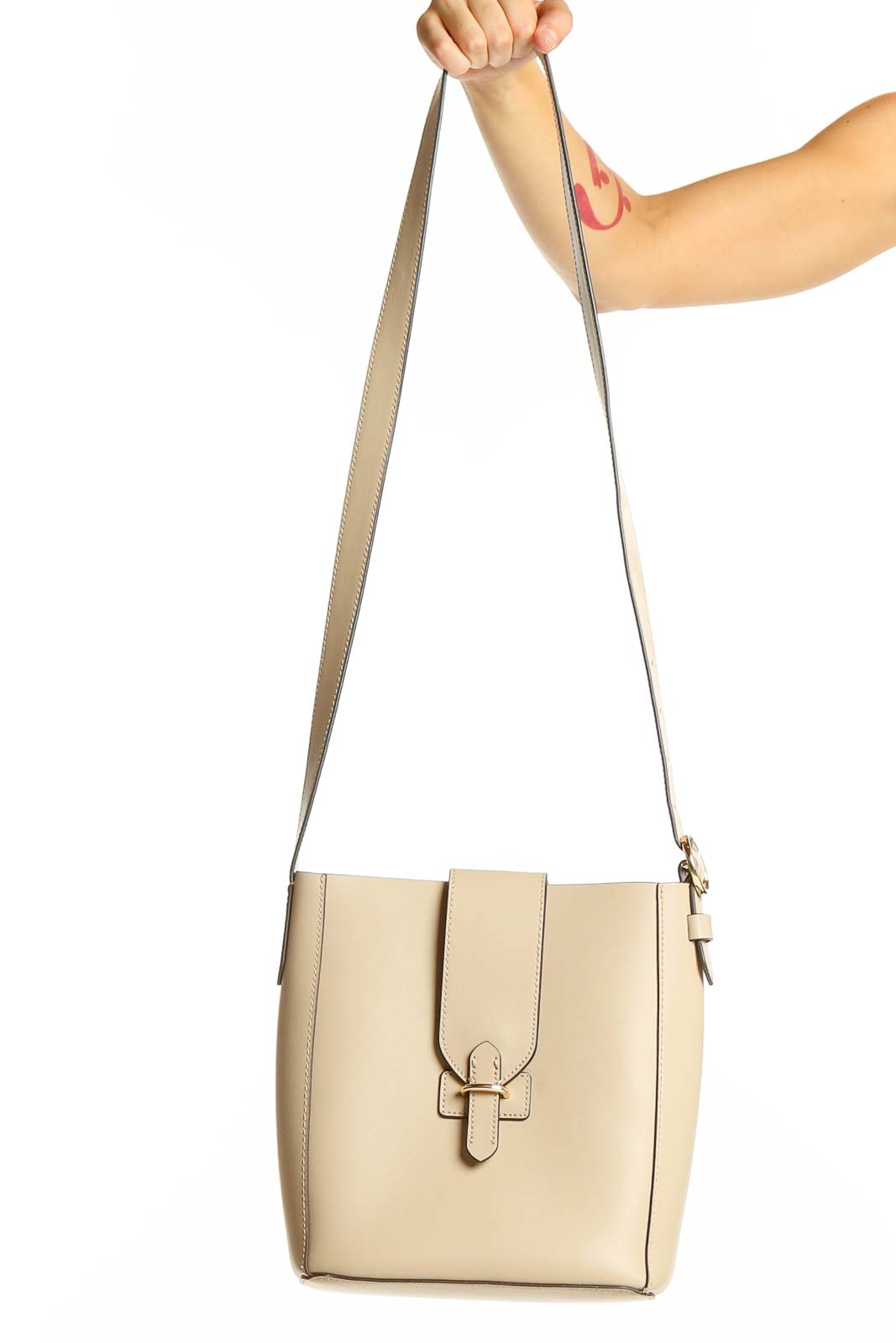 Front view of beige Banana Republic structured crossbody bag with gold clasp