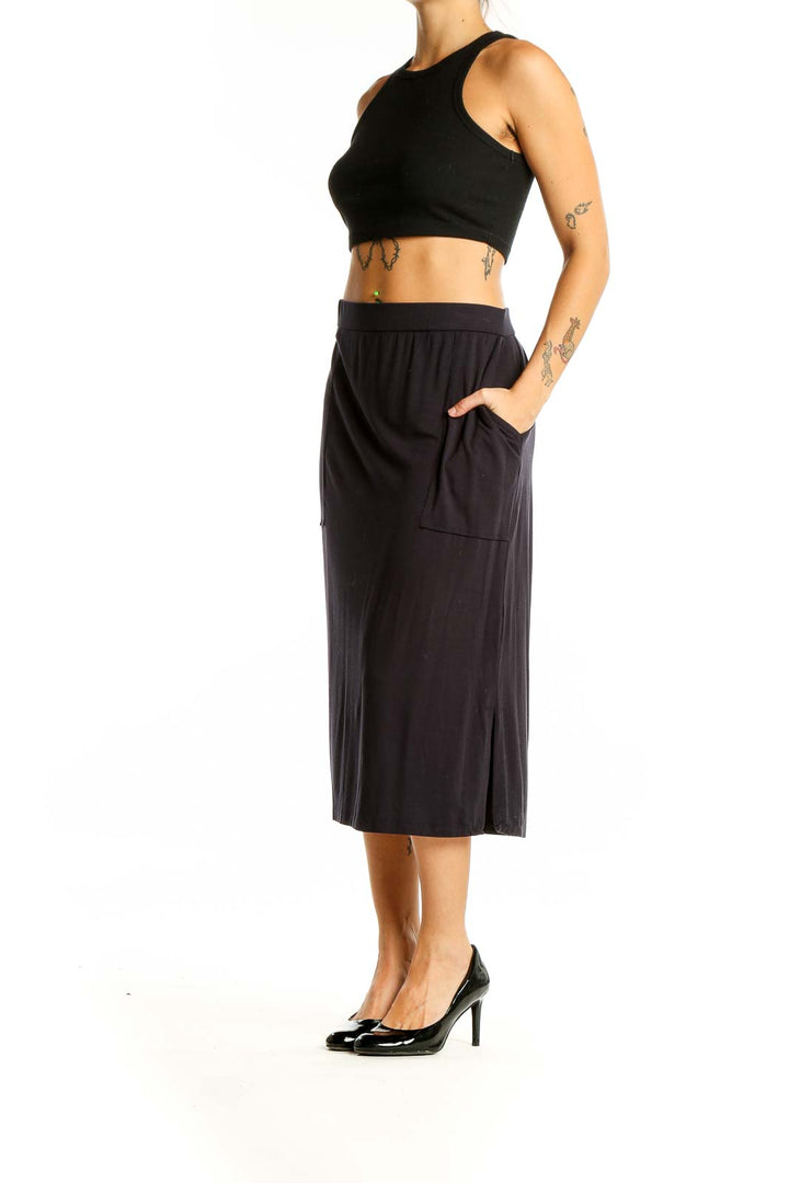 Front view of Eileen Fisher black midi A-line skirt