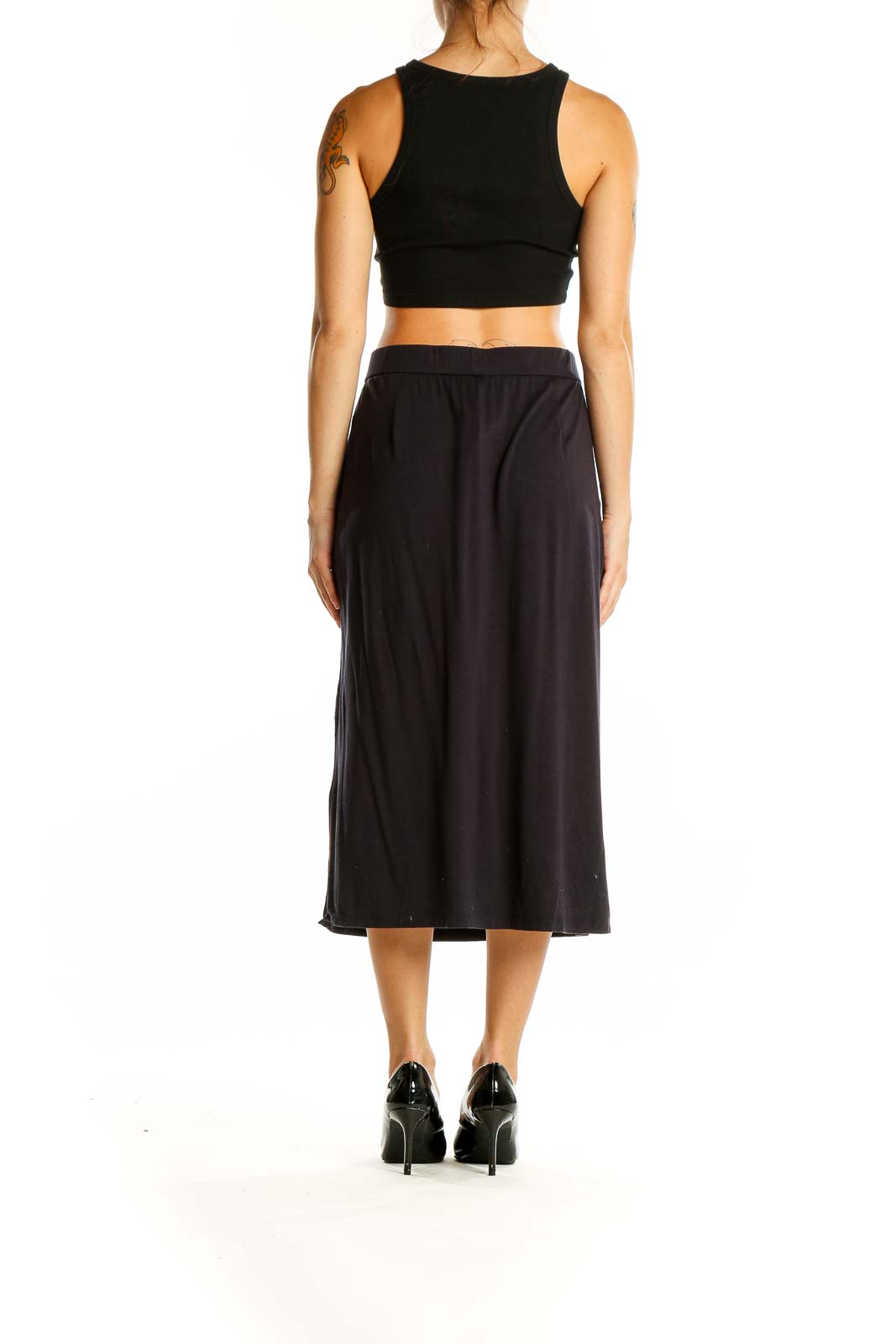 Back view of Eileen Fisher black midi A-line skirt on model