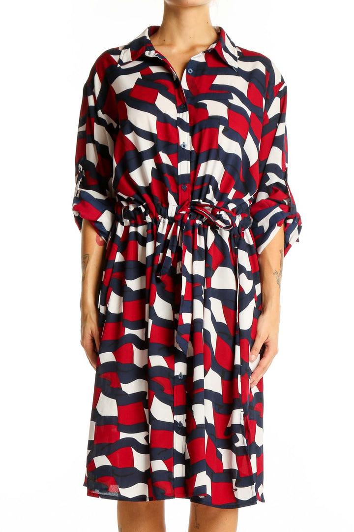 Front view of Tommy Hilfiger geometric print shirt dress in red, white, and navy